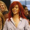 Rihanna en chemise dans les rues de New York avec ses amis, le 18 juillet 2011
