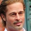 Brad Pitt a débarqué au musée Grévin de Paris ce mardi 26 juillet 2011 aux côtés de George Clooney