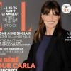 Carla Bruni-Sarkozy révèle sa grossesse au public avec l'aide du magazine Elle. Juin 2011.