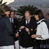 Albert de Monaco et Caroline lors du lancement de la Monaco Classic Week. Le souverain se voit offrir une montre officielle du Yacht Club. 14 septembre 2011