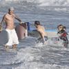 David Beckham et ses enfants Brooklyn, Romeo et Cruz sur la plage de Malibu le 27 août 2011