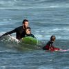 David Beckham et ses enfants en session surf le 29 juillet 2011