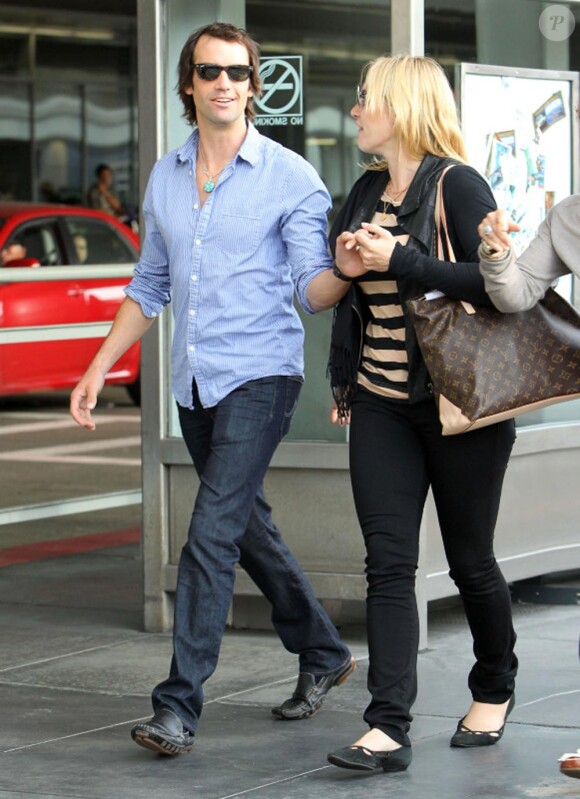 Exclusif :Kate Winslet et son nouveau chéri Ned Rockroll, neveu de Richard Branson, arrivent à l'aéroport de San Francisco le 14 octobre 2011, amoureux !