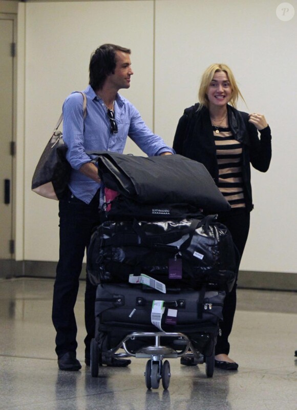 Kate Winslet et son nouveau chéri Ned Rockroll, neveu de Richard Branson, arrivent à l'aéroport de San Francisco le 14 octobre 2011.
