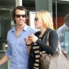 Kate Winslet et son nouveau chéri Ned Rockroll, neveu de Richard Branson, amoureux à leur arrivée à l'aéroport de San Francisco le 14 octobre 2011.