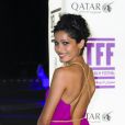 Freida Pinto dans une robe Salvatore Ferragamo lors de la présentation du film Or Noir au festival du film de Tribeca à Doha le 25 octobre 2011