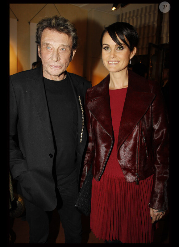 Johnny Hallyday et sa femme Laeticia le 21 novembre 2011 à Paris