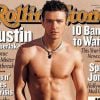 Justin Timberlake expose ses muscles saillants pour le Rolling Stone de janvier 2003.
