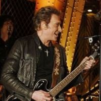 Johnny Hallyday: Un show incroyable à la Tour Eiffel et son Autoportrait dévoilé