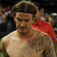 David Beckham affiche ses poignées d'amour et rêve de Jeux Olympiques