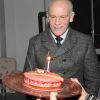 John Malkovich a soufflé son gâteau d'anniversaire peu après minuit lors de la présenté sa collection Technobohemian à Paris le 8 décembre 2011