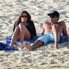 Cindy Crawford et son mari Rande Gerber, très complices sur une plage de Cabo san Lucas au Mexique. Le 31 décembre 2011.