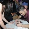 Baptiste Giabiconi signe des autographes après son concert au Metropolis à Rungis le 14 janvier 2012