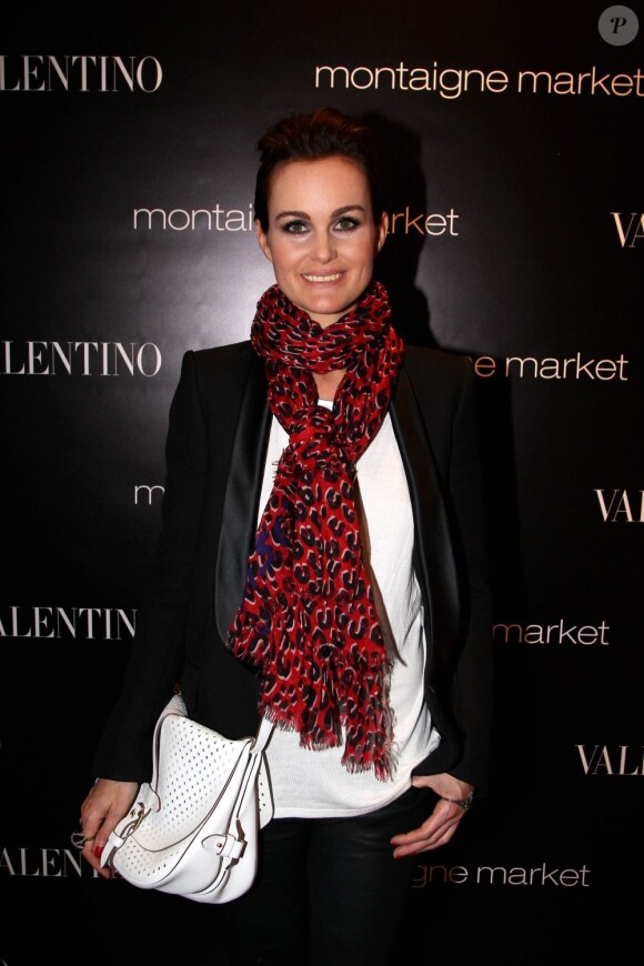 Laeticia Hallyday au lancement du sac Vavavoom de Valentino, vendu en édition limitée et  en  exclusivité au magasin Montaigne Market à Paris, le 25 janvier 2012