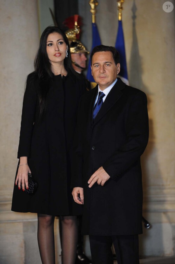 Eric Besson et son épouse Yasmine à l'Élysée, le 26 janvier 2012.