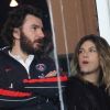 Michaël Youn et Isabelle Funaro lors du match au sommet entre le PSG et Montpellier conclu sur le score de 2-2 au Parc des Princes à Paris le 19 février 2012