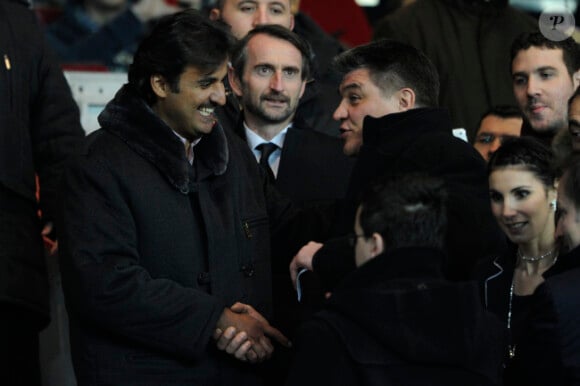 Le cheikh Tamim ben Hamad Al Thani et David Douillet lors du match au sommet entre le PSG et Montpellier (2-2) le 19 février 2012 à Paris au Parc des Princes