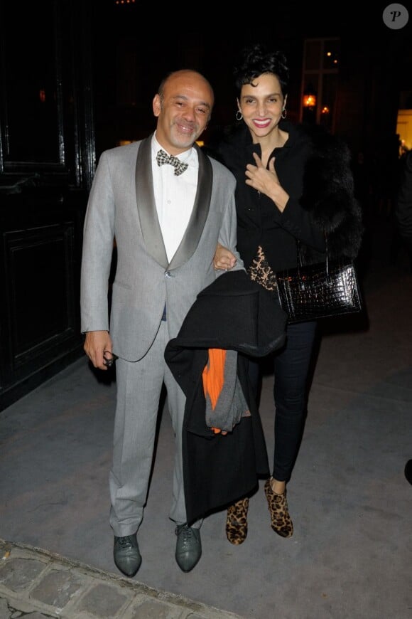 Christian Louboutin et Farida Khelfa lors de la soirée Dior Joaillerie à Paris, le 4 mars 2012.