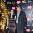 Xavier Darcos et sa femme à la première VIP de la revue  Feu  au Crazy Horse, à Paris, le 12 mars 2012.