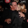 Thierry Ardisson et Audrey Crespo-Mara s'embrassent à la première VIP de la revue Feu au Crazy Horse, à Paris, le 12 mars 2012.