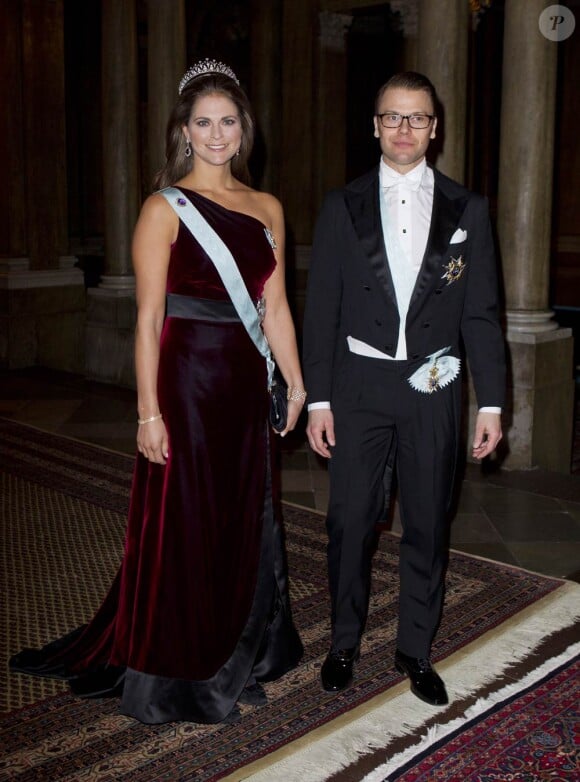 La princesse Madeleine avait le prince Daniel, époux de Victoria, pour cavalier à l'occasion du deuxième dîner officiel de l'année au palais royal de Stockholm le 15 mars 2012.