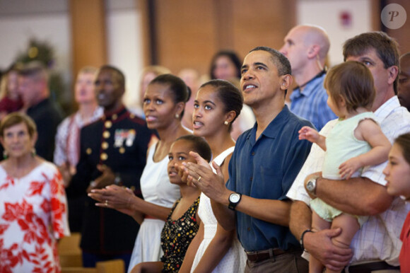 Barack Obama et sa fille Malia, 13 ans, en décembre 2011 à Hawaï.