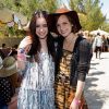 Lily Collins et Emma Watson à la pool party Mulberry à Palm Springs, en marge du festival Coachella le samedi 14 avril 2012