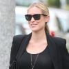 Total look noir twisté par un jean fleuri pour Kristin Cavallari, qui brille de par son style et sa bonne humeur à Beverly Hills, le 25 avril 2012.