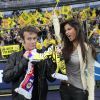 Franck Dubosc et Malika Menard assistent au match opposant l'Olympique Lyonnais à Quevilly, en finale de la Coupe de France, le samedi 28 avril 2012 au Stade de France, près de Paris.
