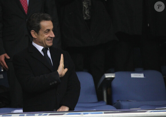 Nicolas Sarkozy assiste au match opposant l'Olympique Lyonnais à Quevilly, en finale de la Coupe de France, le samedi 28 avril 2012 au Stade de France, près de Paris.