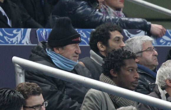 Guy Roux et Ramzy Bédia assiste au match opposant l'Olympique Lyonnais à Quevilly, en finale de la Coupe de France, le samedi 28 avril 2012 au Stade de France, près de Paris.