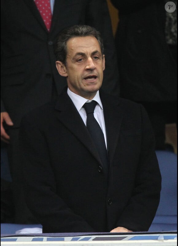 Nicolas Sarkozy assiste au match opposant l'Olympique Lyonnais à Quevilly, en finale de la Coupe de France, le samedi 28 avril 2012 au Stade de France, près de Paris.