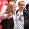 Emma Stone et Olivia Wilde participent à l'événement caritatif organisé par Revlon, pour sensibliser l'opinion public à la lutte contre le cancer du sein. New York, le 5 mai 2012