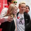 Emma Stone et Olivia Wilde participent, avec Jimmy Fallon, à l'événement caritatif organisé par Revlon, pour sensibliser l'opinion public à la lutte contre le cancer du sein. New York, le 5 mai 2012