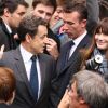 Nicolas Sarkozy et Carla Bruni ont voté au lycée Jean de la fontaine dans le XVIe arrondissement de Paris, le 6 mai 2012.