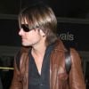 Nicole Kidman et son mari Keith Urban sortent de l'aéroport de Los Angeles avec leurs filles le 29 mars 2012