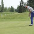 Olivier Patience sur le green... Le 19e Trophée Kimbo Sport Passion a pu compter sur la participation de 80 personnalités du monde du sport parmi 200 invités pour son édition 2012, le 10 mai au golf de Feucherolles (Yvelines).