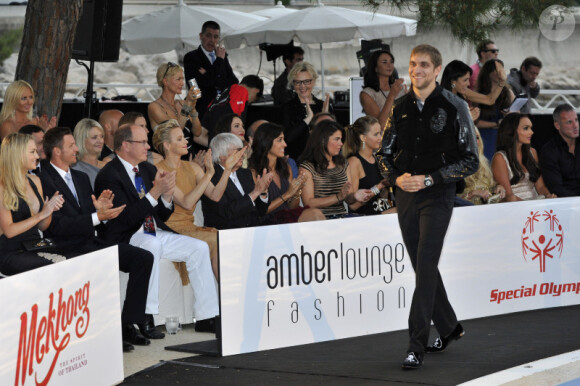 Albert de Monaco et Charlene Wittstock lors du Amber Lounge Fashion Show à l'hôtel Le Médirien à Monaco le 25 mai 2012
