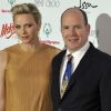 Le prince Albert et Charlene de Monaco lors du Amber Lounge Fashion Show à l'hôtel Le Médirien à Monaco le 25 mai 2012