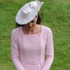 Kate Middleton lors de la deuxième garden party à Buckingham Palace, le 29 mai 2012, dans le cadre des célébrations du jubilé de diamant de la reine Elizabeth II. La duchesse de Cambridge porte la même robe Emilia Wickstead que précédemment pour le déjeuner de la souveraine à Windsor, le 18 mai, et un chapeau Jane Corbett.