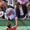 Michèle Laroque et François Baroin félicitent Richard Gasquet après son match sur le court Suzanne-Lenglen, à Roland-Garros, le 2 juin 2012.