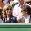 Michèle Laroque et son compagnon François Baroin dans les tribunes du court Suzanne-Lenglen de Roland-Garros, le 2 juin 2012.