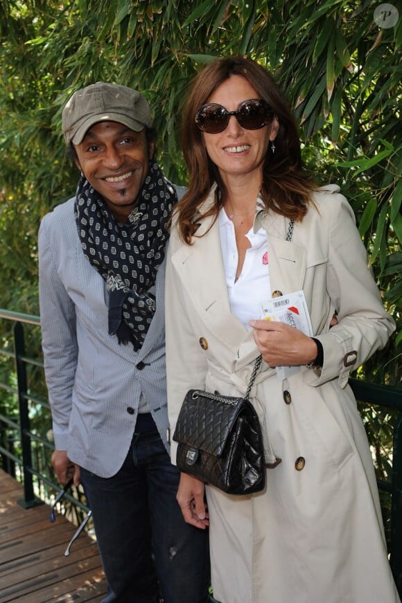 Manu Katché et son épouse Laurence au tournoi de Roland-Garros, le 8 juin 2012.