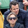 Anne-Sophie Lapix et son mari lors de la finale entre Rafael Nadal et Novak Djokovic à Roland-Garros le 10 juin 2012
