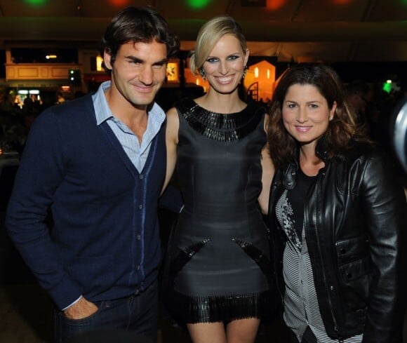 Roger Federer, Karolina Kurkova et Mirka, lors d'une soirée fashion en Allemagne. Le 17 juin 2012
