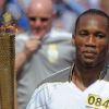 Didier Drogba en porteur de la flamme olympique le 23 mai 2012 à Swindon