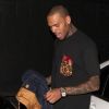 Hilare, Chris Brown sort d'un club à Hollywood le 3 juillet 2012