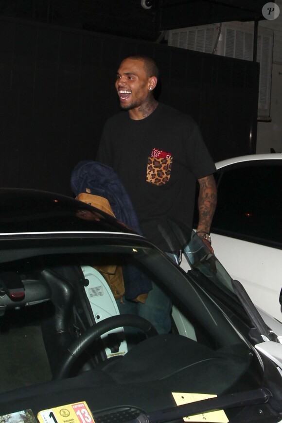 Chris Brown et sa petite amie Karrueche Tran sortent d'une boite de nuit à Hollywood le 3 juillet 2012