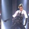 Madonna harnaché en Jean-Paul Gaultier en concert à l'Olympia, le 26 juillet 2012.