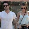 Adam Levine et sa petite amie Behati Prinsloo quittent le Mustard Cafe et s'apprêtent à grimper à moto. Los Angeles, le 7 août 2012.